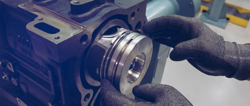 Engineer working on an engine